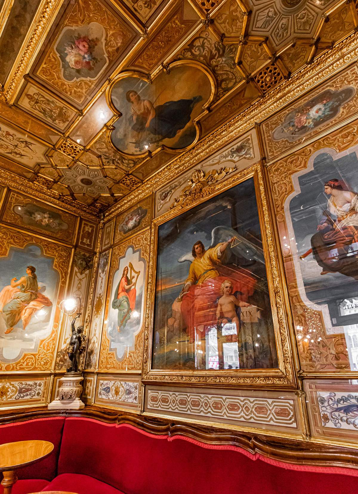 ornate painting and ceilings inside Caffè Florian