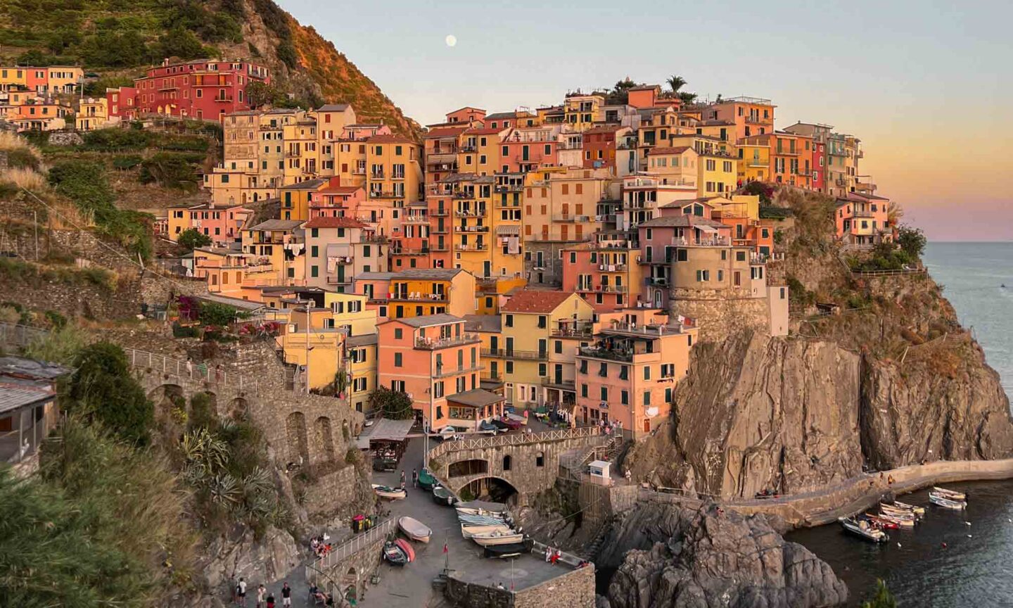 Sunset over colourful Italian Village Manarola