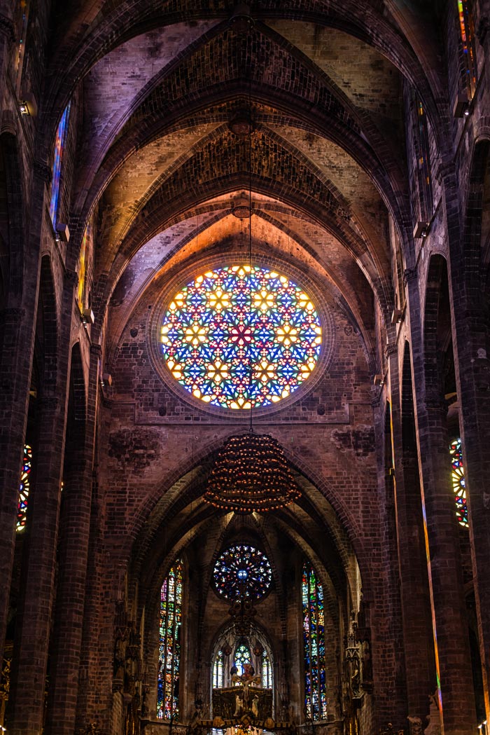 Colourful stained glass window inside a cathedral