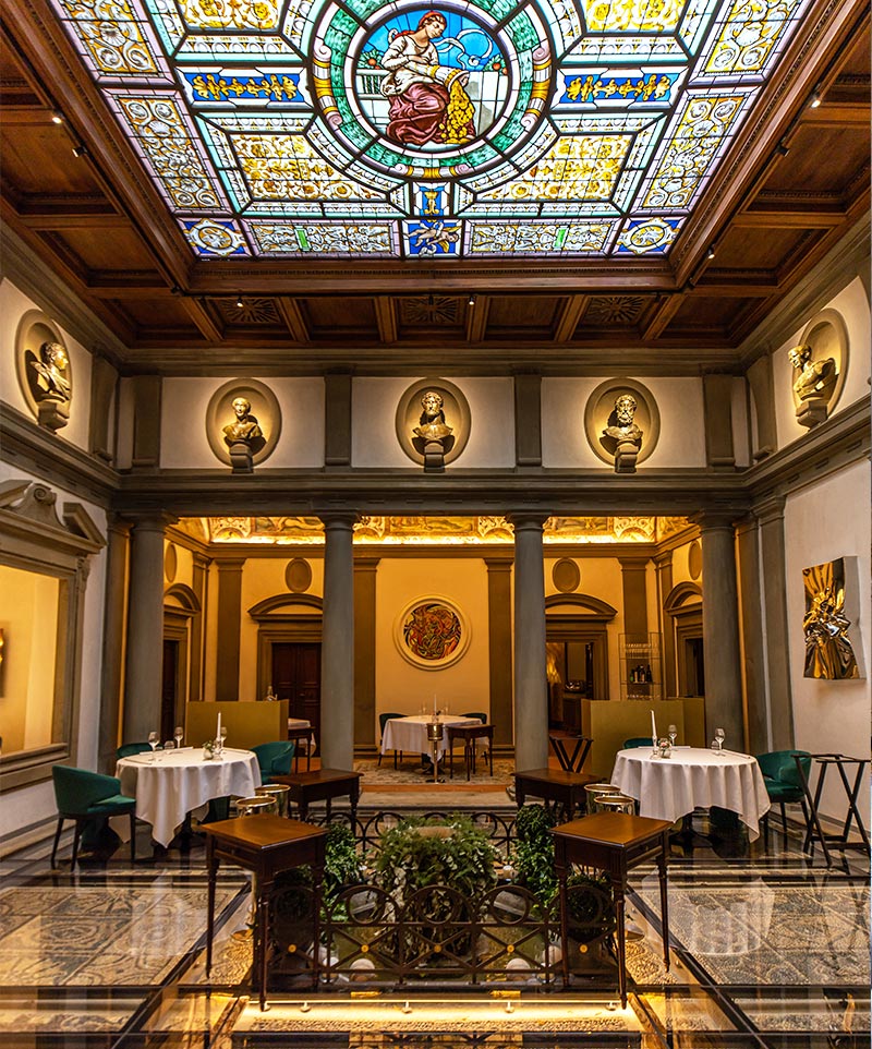beautiful restaurant interior with stained glass ceiling